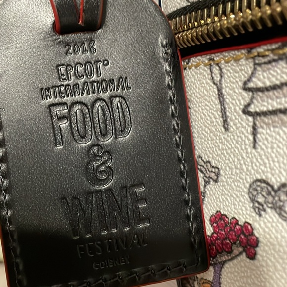 A EPCOT Food and wine festival Dooney and Bourke from 2018. - Picture 3 of 7